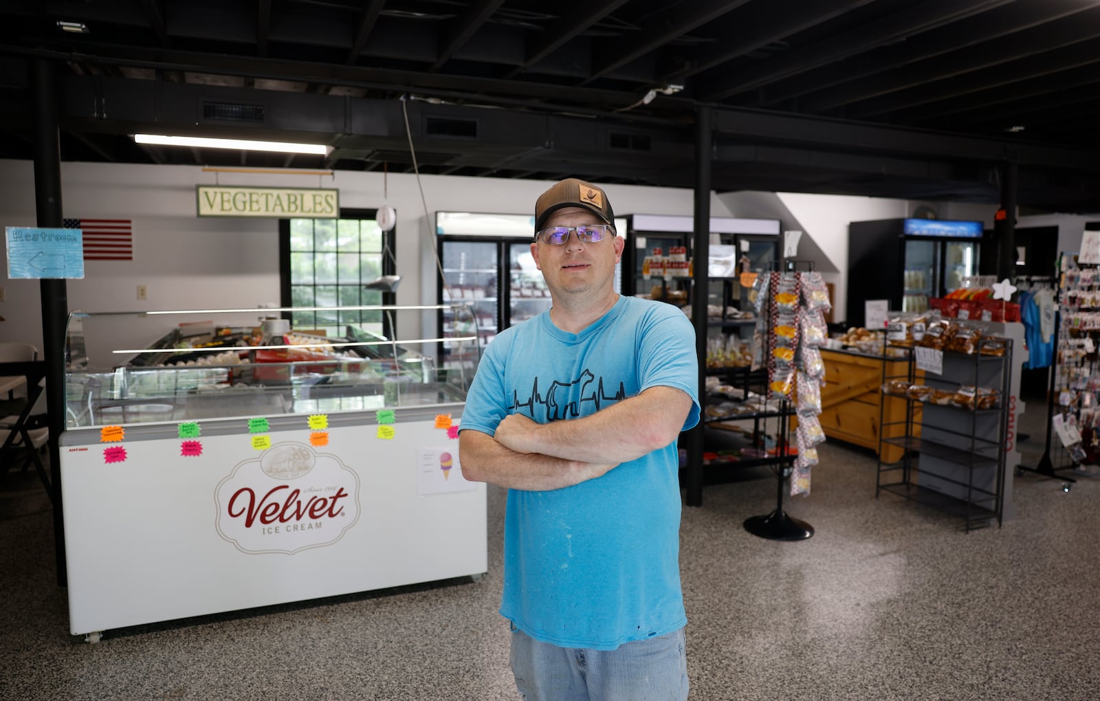 General manager Chad Watkins poses for a portrait in the general store of the Evans Family Ranch on Monday, June 16, 2025, in New Carlisle. JOSEPH COOKE/STAFF
