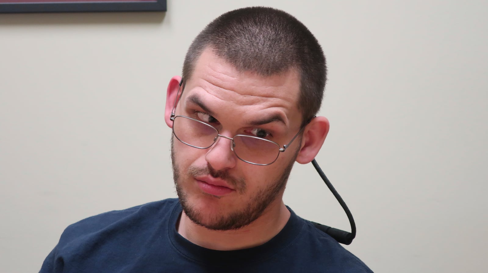 Matthew Hull, a Kansas resident who has cerebral palsy, is interviewed by The Associated Press at the Disability Rights Center in Topeka, Kans., June 18, 2025. (AP Photo/John Hanna)