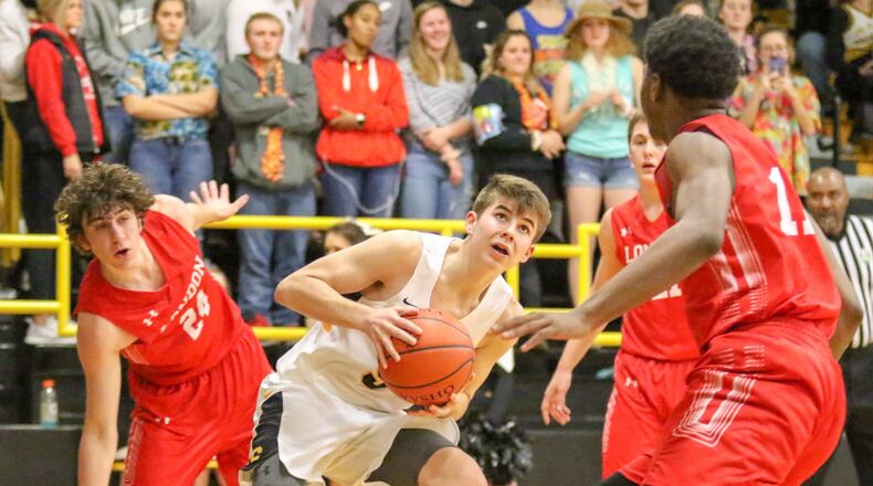 Shawnee High School’s Isaac Siemon drives to the basket during their game against London in Springfield last season. CONTRIBUTED PHOTO BY MICHAEL COOPER