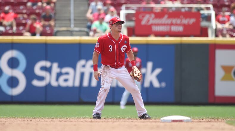 Scooter Gennett plays second base in his last game with the Reds on Wednesday, July 31, 2019, at Great American Ball Park in Cincinnati.