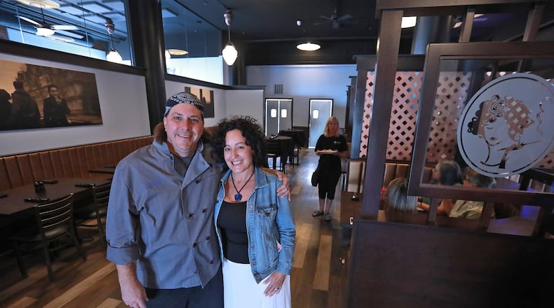 Stella Bleu Bistro co-owners, Chef Darin Mitchell and Jennie Osterholt during the grand opening of the new restaurant in downtown Springfield. BILL LACKEY/STAFF
