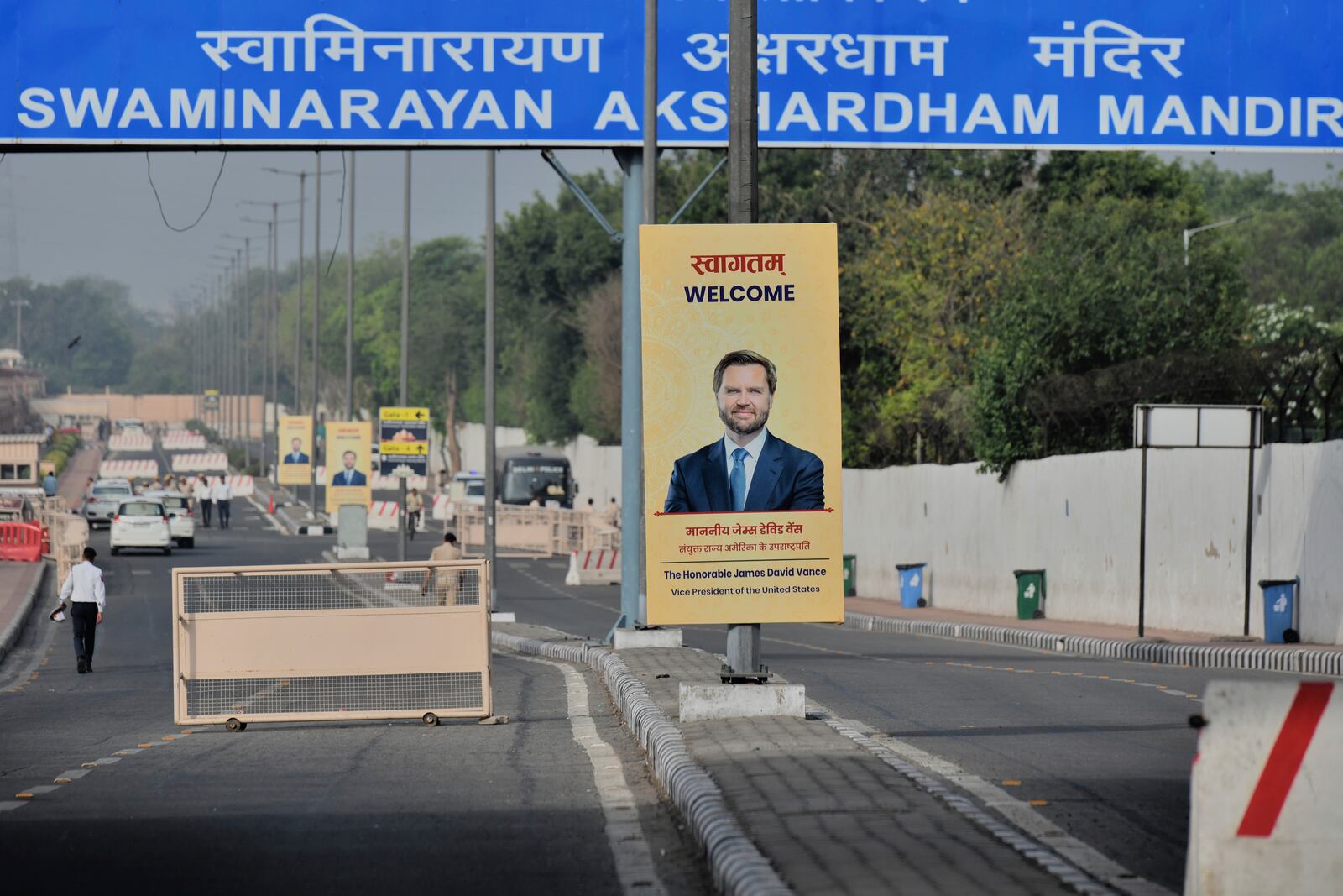 A banner welcoming U.S. Vice President J.D. Vance is tied to an electric pole on a street in New Delhi, India, Monday, April 21, 2025. (AP Photo)