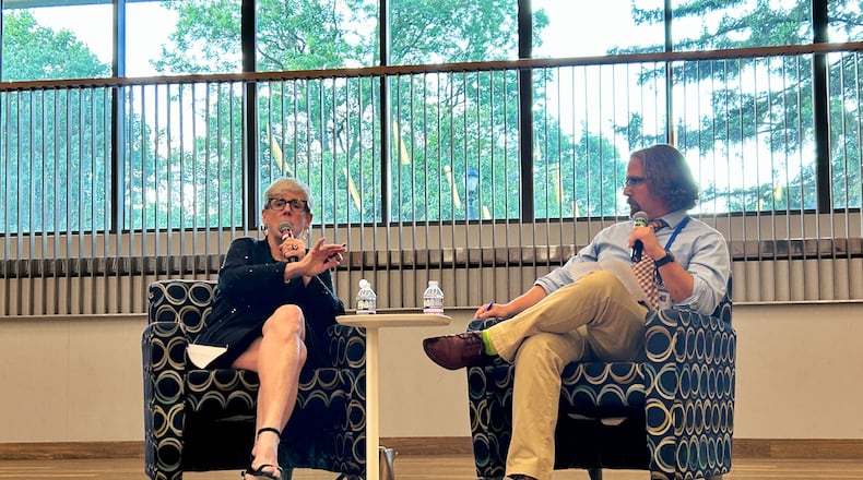 Retired Chief Justice Maureen O'Connor, left, answers questions about Issue 1, a redistricting reform that would bar politicians from drawing legislative districts. Dayton Daily News reporter Josh Sweigart, right, moderates the event at Dayton Metro Library. August 20, 2024.