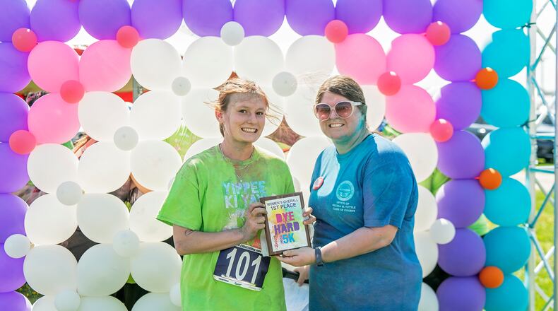 Kaylee Yontz, first place overall winner and women’s first place winner of the Dye Hard 5K. She received her award from Melissa Tuttle, Clerk of Common Pleas Court. Contributed