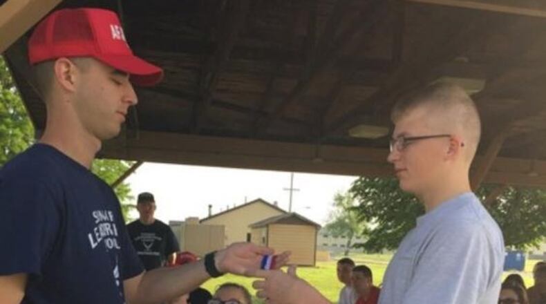 Tecumseh High School graduate John Scott receiving a medal at a summer leadership program at Camp Perry. . CONTRIBUTED