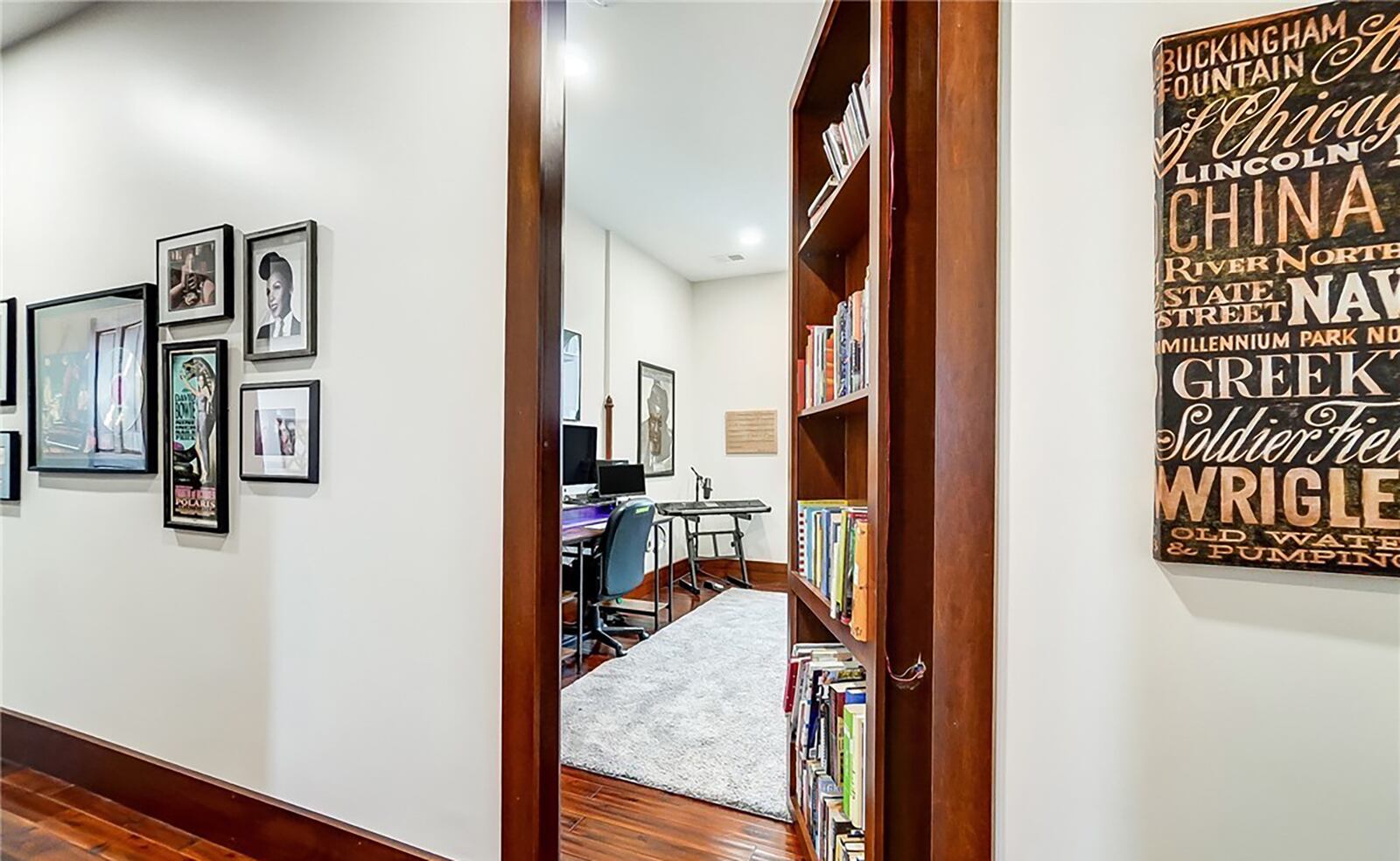 The third level has an office hidden behind a bookcase.