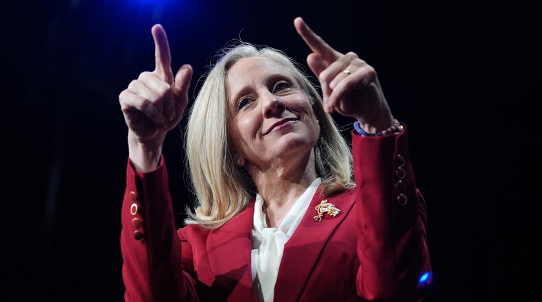 Democrat Abigail Spanberger points out at the crowd after she was declared the winner of the Virginia governor's race during an election night watch party Tuesday, Nov. 4, 2025, in Richmond, Va. (AP Photo/Stephanie Scarbrough)