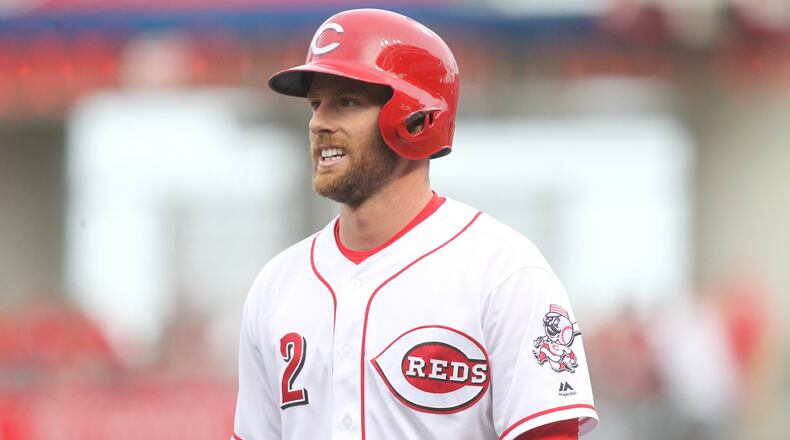 Reds shortstop Zack Cozart smiles during a game in May at Great American Ball Park. David Jablonski/Staff