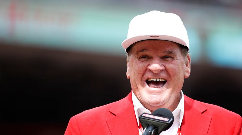 Former Cincinnati Reds great Pete Rose reacts during a statue dedication ceremony prior to a game against the Dodgers at Great American Ball Park on June 17.