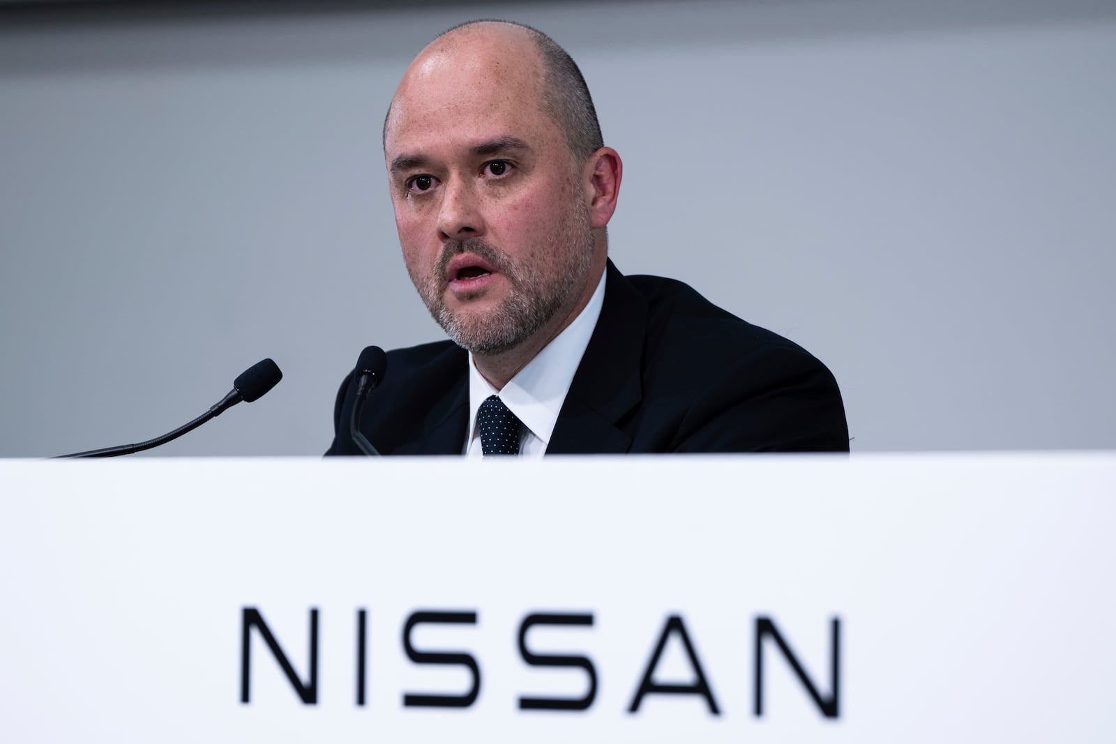 Nissan CEO Ivan Espinosa attends a press conference to announce 2024 fiscal year financial results in Yokohama, Tuesday, May 13, 2025. (AP Photo/Louise Delmotte)