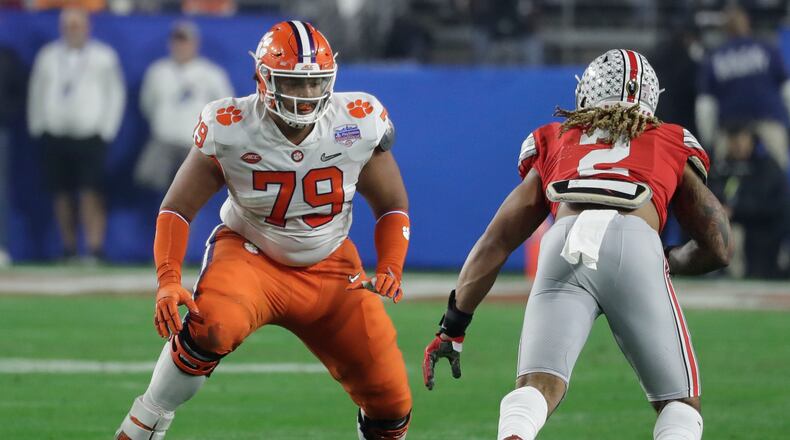 FILE - In this Dec. 28, 2019, file photo, Clemson offensive tackle Jackson Carman (79) looks to block during the first half of the Fiesta Bowl NCAA college football game against Ohio State in Glendale, Ariz. The Cincinnati Bengals got some help for their offensive line Friday night, taking Carman with their second-round pick in the NFL draft. (AP Photo/Rick Scuteri, File)
