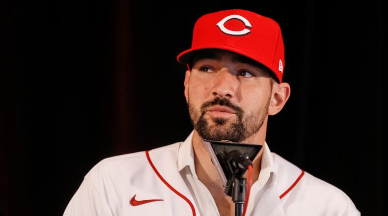 Cincinnati Reds’ Nick Castellanos takes questions from reporters during a news conference, Tuesday, Jan. 28, 2020, in Cincinnati. Castellanos signed a $64 million, four-year deal with the baseball club. (AP Photo/John Minchillo)