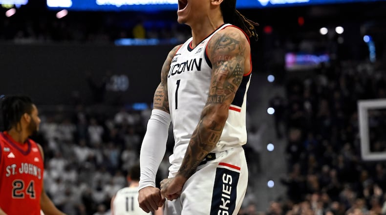 UConn guard Solo Ball reacts in the first half of an NCAA college basketball game against St. John's, Wednesday, Feb. 25, 2026, in Hartford, Conn. (AP Photo/Jessica Hill)