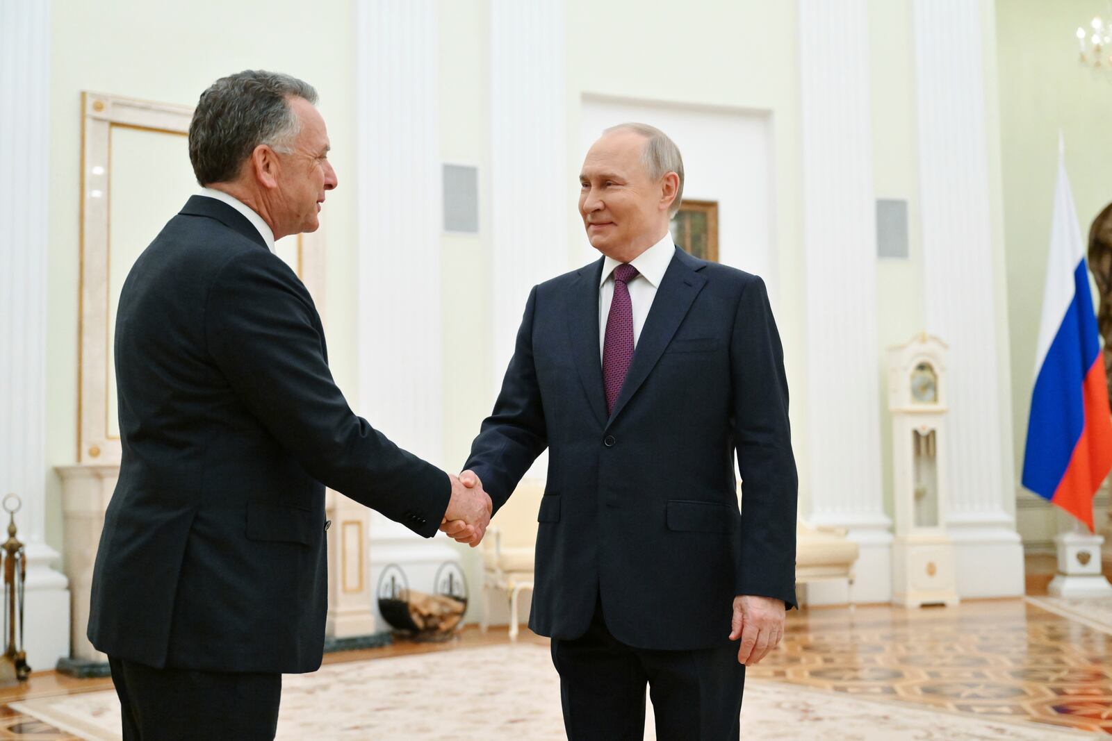 Russian President Vladimir Putin, right, and U.S. President Donald Trump's special envoy Steve Witkoff greet each other prior to their talks at the Kremlin in Moscow, Russia, Friday, April 25, 2025. (Kristina Kormilitsyna, Sputnik, Kremlin Pool Photo via AP)