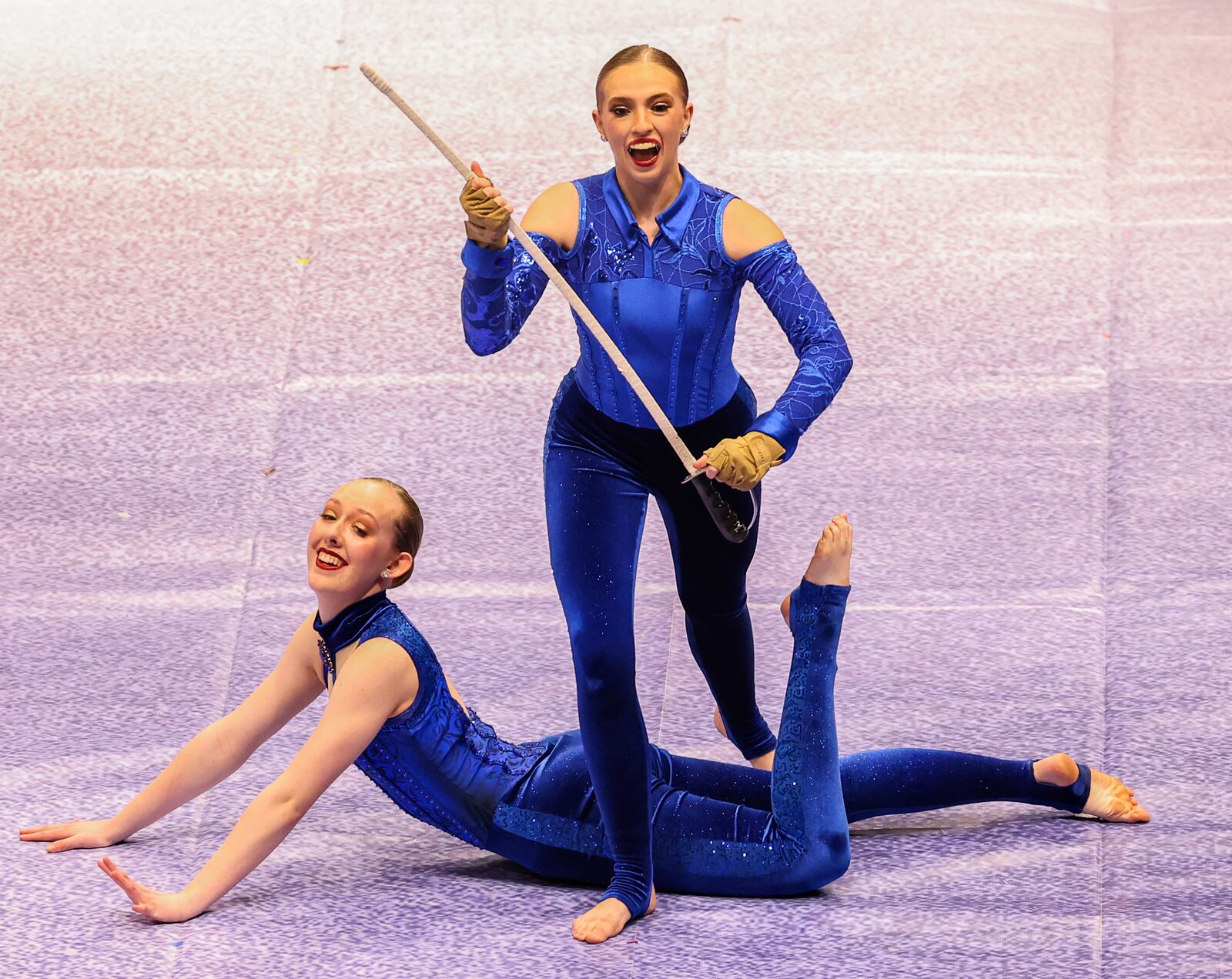 Members of Bellbrook High School's color guard perform during the Winter Guard International's World Championships Scholastic Semifinals on Friday morning at University of Dayton Arena. BRYANT BILLING / STAFF