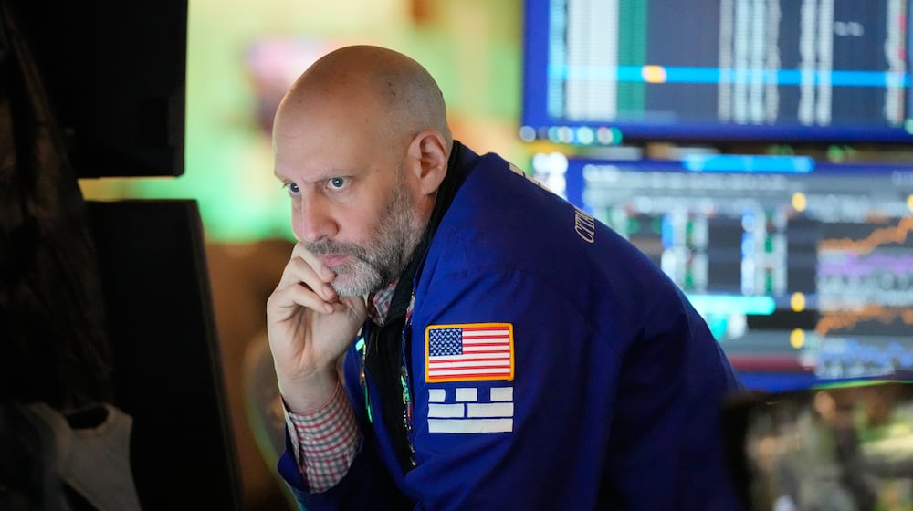 Meric Greenbaum works on the floor at the New York Stock Exchange in New York, Tuesday, March 3, 2026. (AP Photo/Seth Wenig)