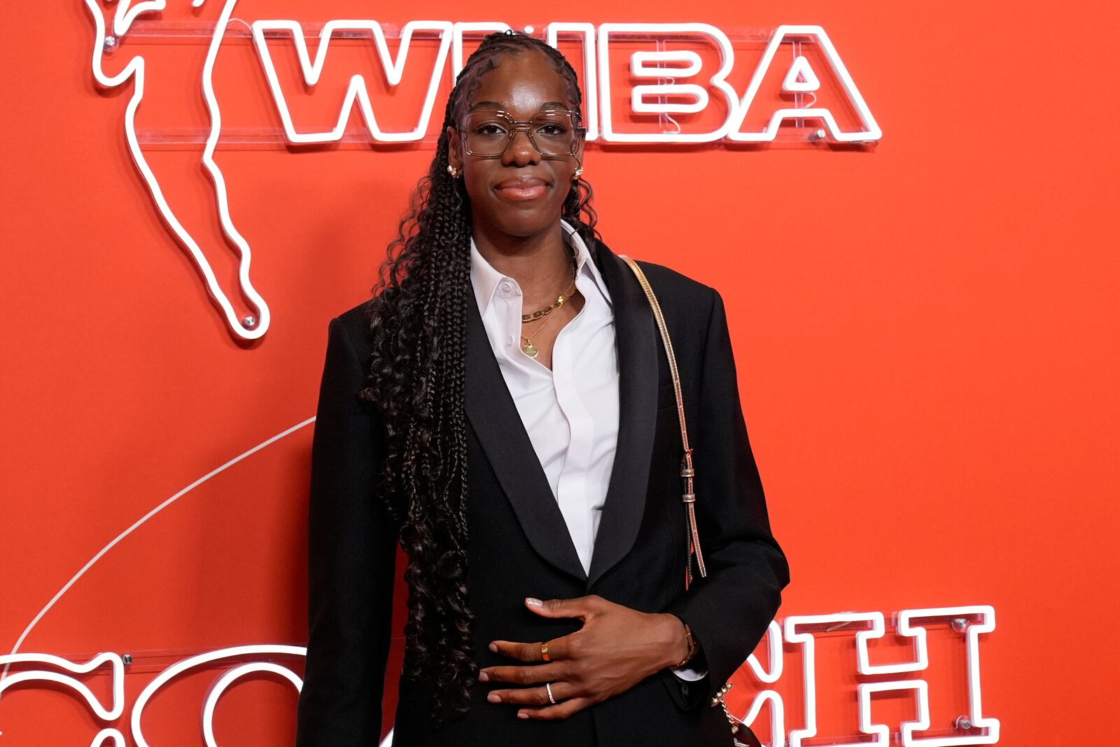 Dominique Malonga poses before the WNBA basketball draft, Monday, April 14, 2025, in New York. (AP Photo/Pamela Smith)