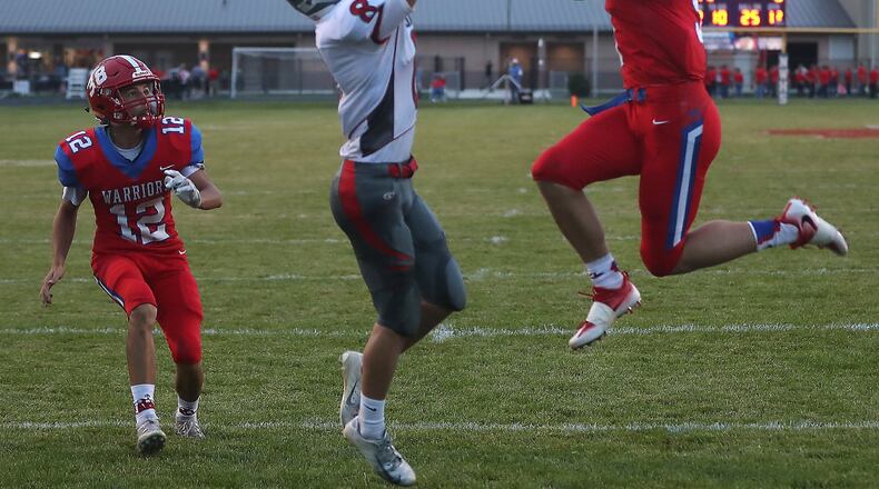 Northwestern’s Ben VanNoord breaks up a pass for Southeastern’s Duke McCombs. BILL LACKEY/STAFF