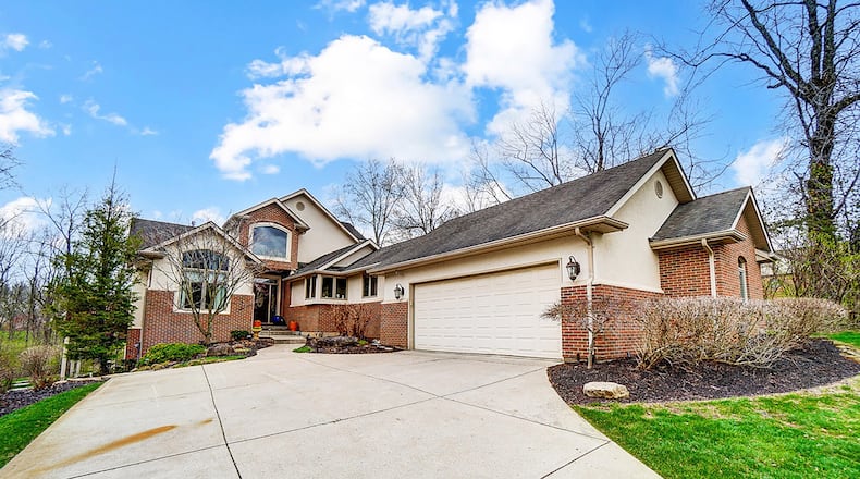 This custom built, one owner two story sits on an acre plus lot with professional landscaped areas and wrap around wood deck.