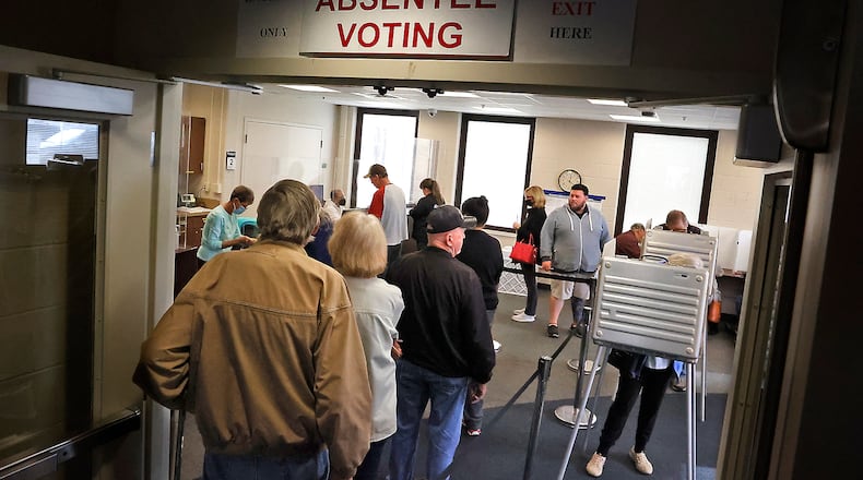 Clark County residents wait in line Wednesday, Nov. 2, 2022, to vote early at the Clark County Board of Elections. BILL LACKEY/STAFF