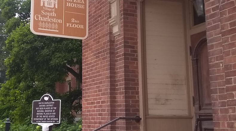 The South Charleston Heritage Commission is celebrating a new sign at the announcing the location of the Opera House and a new book about the man who "built South Charleston.'' CONTRIBUTED
