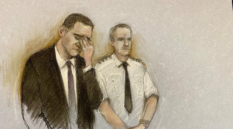 This courtroom sketch by Elizabeth Cook shows Paul Doyle appearing at Liverpool Crown Court, Tuesday Nov. 25, 2025, during his trial where he is accused of multiple offenses after allegedly driving into crowds of football fans gathered in the city centre for the Liverpool FC end of season victory parade on May 26. (Elizabeth Cook/PA via AP)