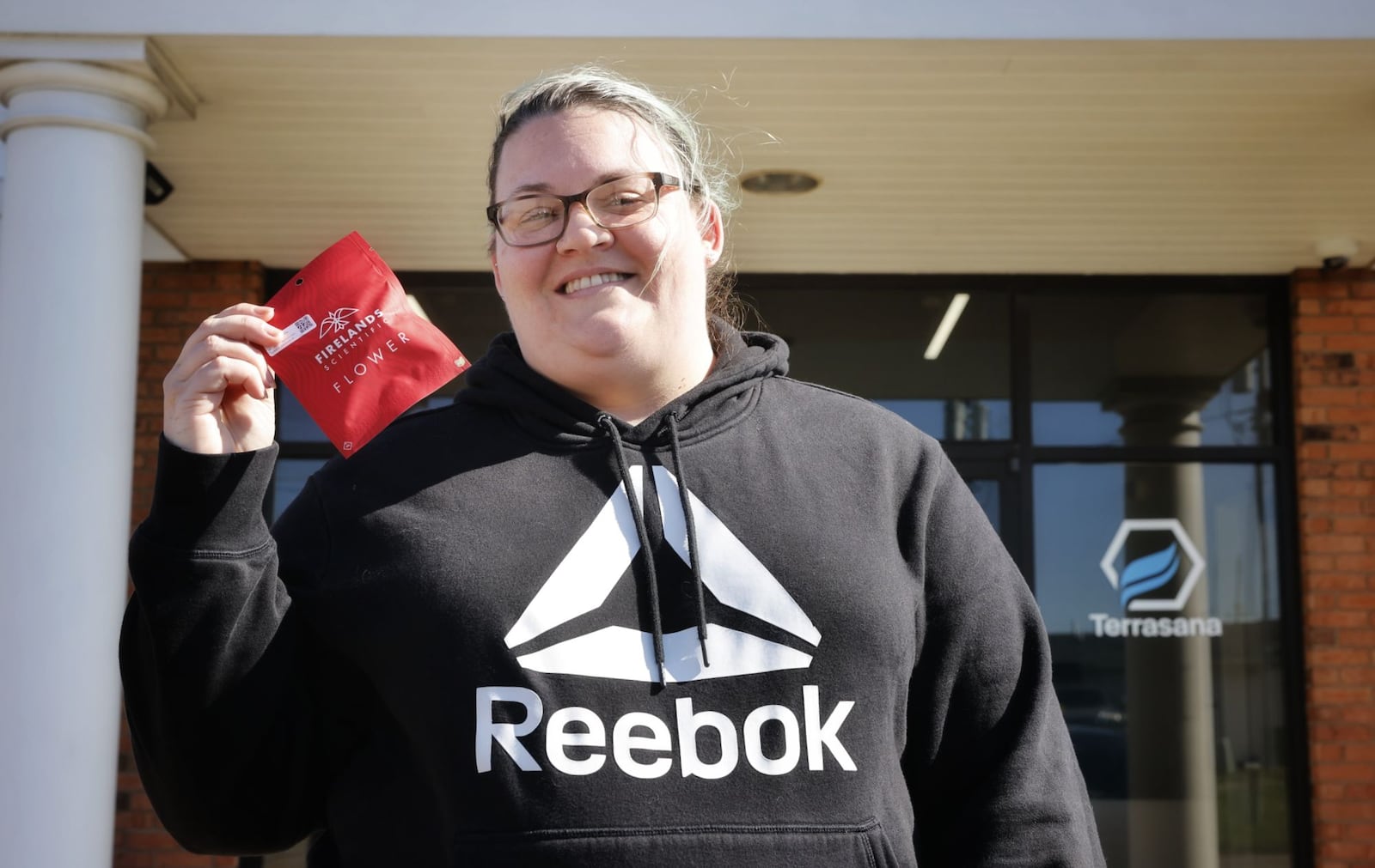 Terrasana Dispensary is now open on Dixie Highway in Middletown. The dual use facility can serve both medical and non-medical recreational cannabis customers. Britny Feltner was the first customer through the doors Wednesday morning. NICK GRAHAM/STAFF