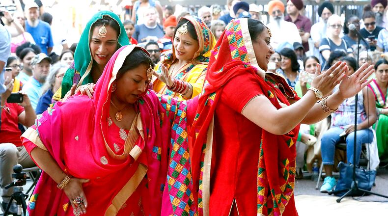 Members of the Sikh dance group Punjabi Bhangra perform a few years ago during CultureFest. BILL LACKEY/STAFF