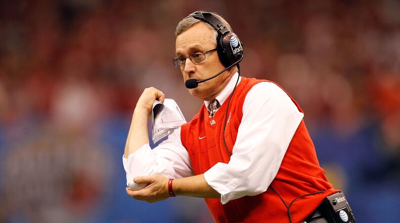 NEW ORLEANS, LA - JANUARY 04:  Head coach Jim Tressel of the Ohio State Buckeyes calls out in the first half against the Arkansas Razorbacks during the Allstate Sugar Bowl at the Louisiana Superdome on January 4, 2011 in New Orleans, Louisiana.  (Photo by Matthew Stockman/Getty Images)