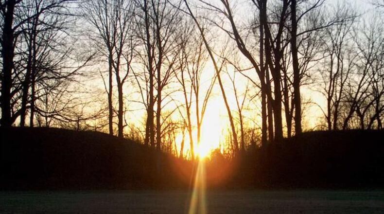 Sunrise Between the Mounds of Fort Ancient Earthworks.