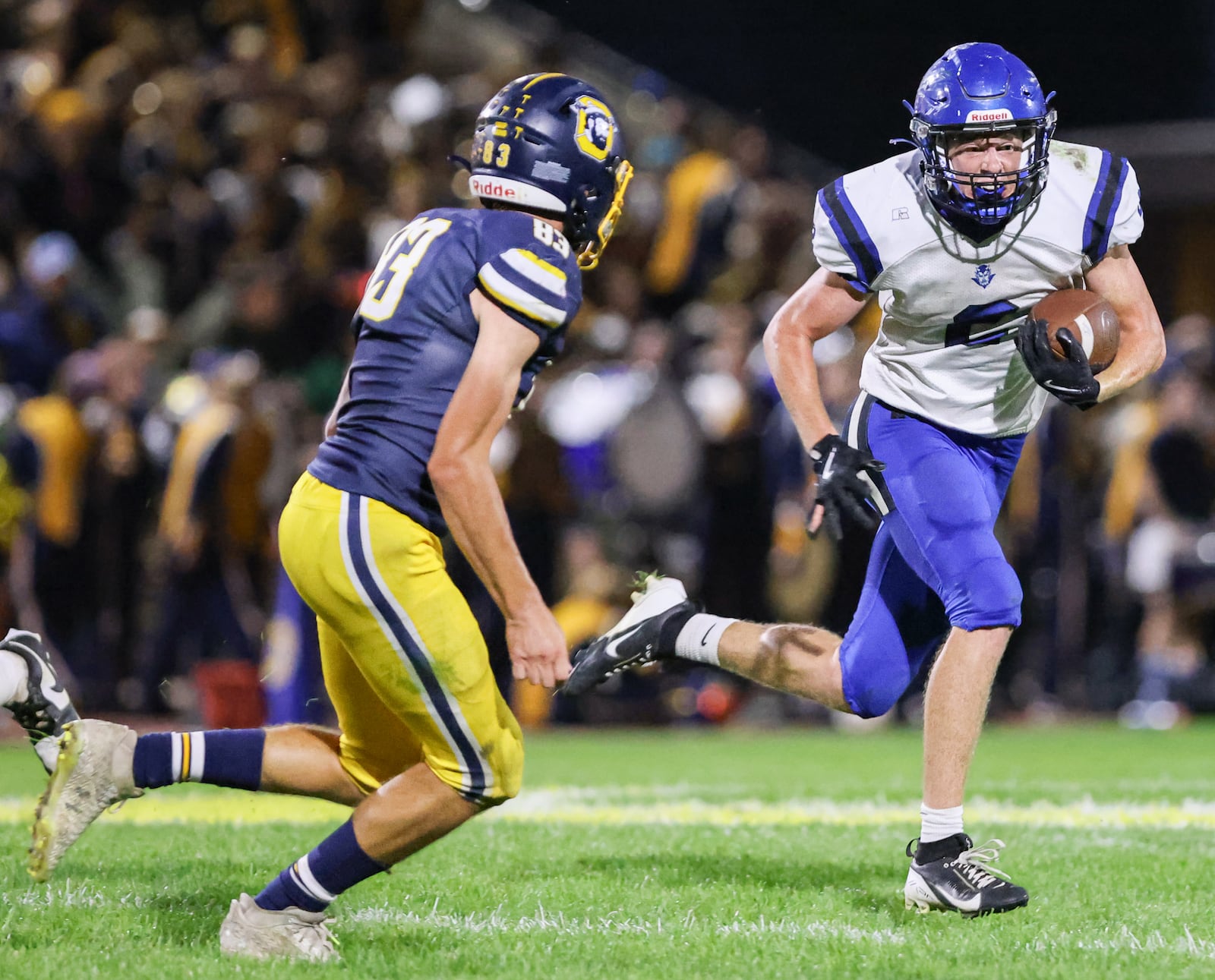 Brookville senior running back DJ Moore runs as Oakwood's Owen Coyne pursues during a Southwestern Buckeye League game on Friday, Oct. 3 at Mack Hummon Stadium. BRYANT BILLING / STAFF