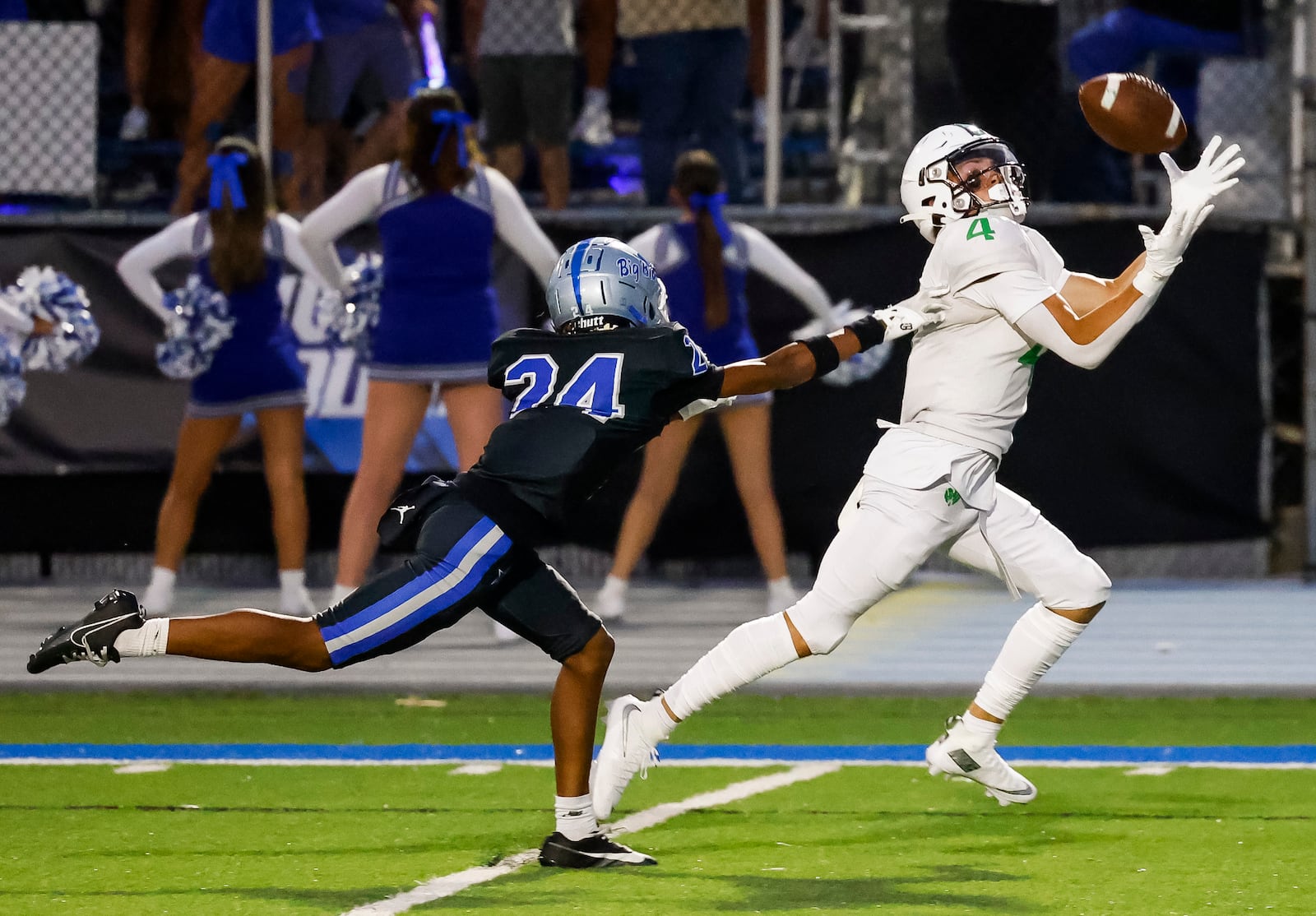 Badin's James Brink makes a catch for a touchdown defended by Hamilton's DJ Bryant on week one of high school football Friday, Aug. 22, 2025 at Virgil M. Schwarm Stadium in Hamilton. Badin won 38-20. NICK GRAHAM/STAFF