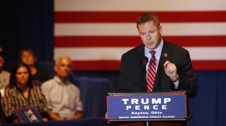 Warren Davidson introduced then-Vice Pesidential candidate Gov. Mike Pence at a campaign stop in Dayton. TY GREENLEES / STAFF