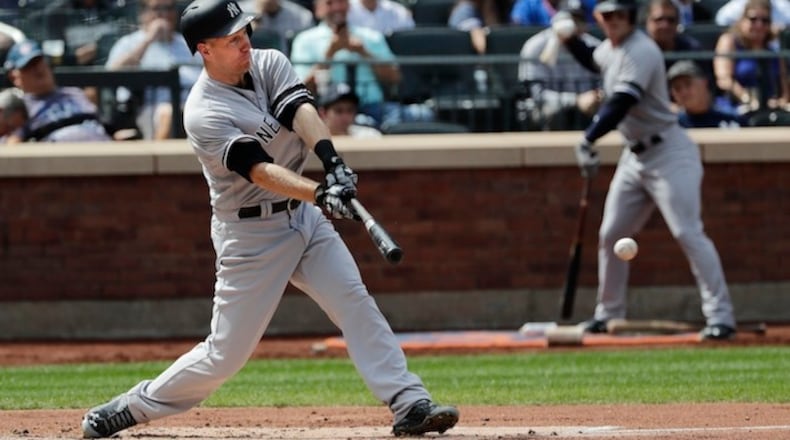 New York Yankees' Todd Frazier hits an RBI single during the second inning of a baseball game against the Tampa Bay Rays Wednesday, Sept. 13, 2017, in New York. (AP Photo/Frank Franklin II)