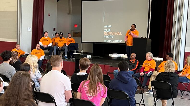 Dion Green speaks to Springfield students on Tuesday about the loss of his father, who was killed in a mass shooting in Dayton in 2019.
