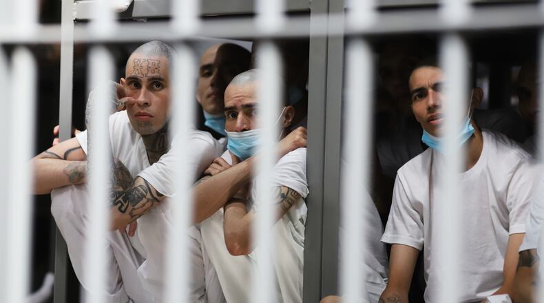 FILE - Prisoners sit in their cell at the mega prison known as Detention Center Against Terrorism (CECOT) in Tecololuca, El Salvador, Jan. 30, 2026. (AP Photo/Salvador Melendez, file)