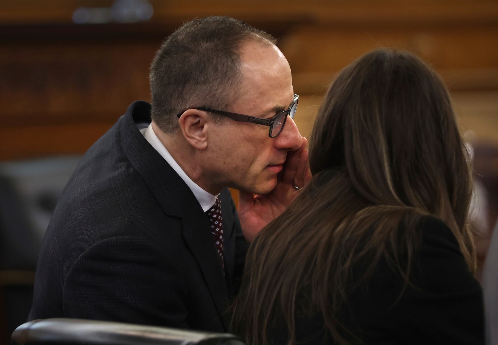 Attorney David Yannetti whispers into the ear of Karen Read during jury selection in the murder trial of Read at Norfolk Superior Court Tuesday, April 15, 2025, in Dedham, Mass. (Nancy Lane/The Boston Herald via AP, Pool)