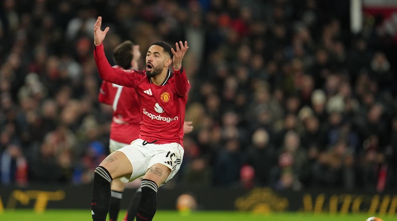 Manchester United's Matheus Cunha reacts during the FA Cup third round soccer match between Manchester United and Brighton in Manchester, England, Sunday, Jan. 11, 2026. (AP Photo/Jon Super)