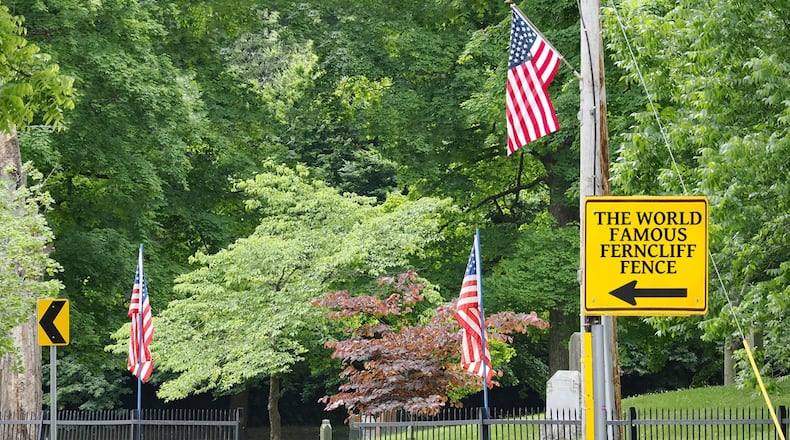A sign points to a section of missing fence at Ferncliff Cemetery. The fence has been struck by cars 65 times since 2018. CONTRIBUTED