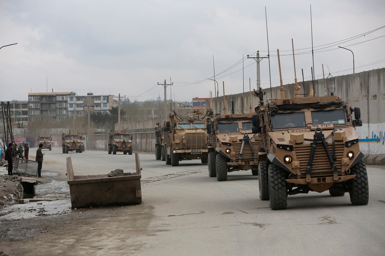 FILE - This March 25, 2020 file photo shows British troops with NATO-led Resolute Support Mission forces in Kabul, Afghanistan. (AP Photo/Rahmat Gul, file)