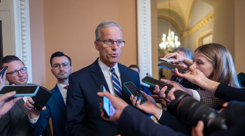 Speaking to reporters, Senate Majority Leader John Thune, R-S.D., responds to Senate Democratic Leader Chuck Schumer to reopen the government if Republicans extend expiring health care subsidies for one year, at the Capitol in Washington, Friday, Nov. 7, 2025, day 38 of the government shutdown. (AP Photo/J. Scott Applewhite)