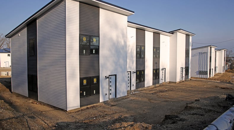 The Hillside Townhomes on Hillside Avenue are nearing completion Friday, March 22, 2024. BILL LACKEY/STAFF