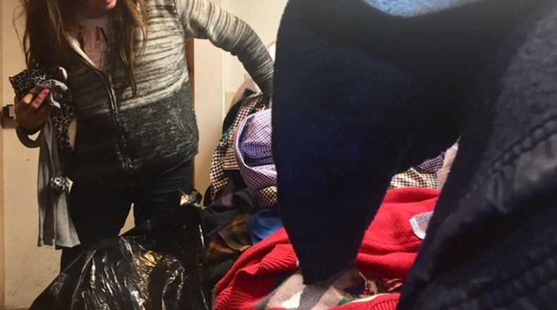 The Springfield Soup Kitchen, in partnership with Greater Grace Temple and The Turner Foundation, is providing three meals to people on Christmas Eve and New Year’s Eve, as well as giving out clothes and blankets. JENNA LAWSON/STAFF