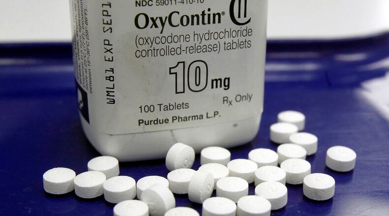 OxyContin pills are arranged for a photo at a pharmacy in Montpelier, Vt., Feb. 19, 2013. (AP Photo/Toby Talbot, File)