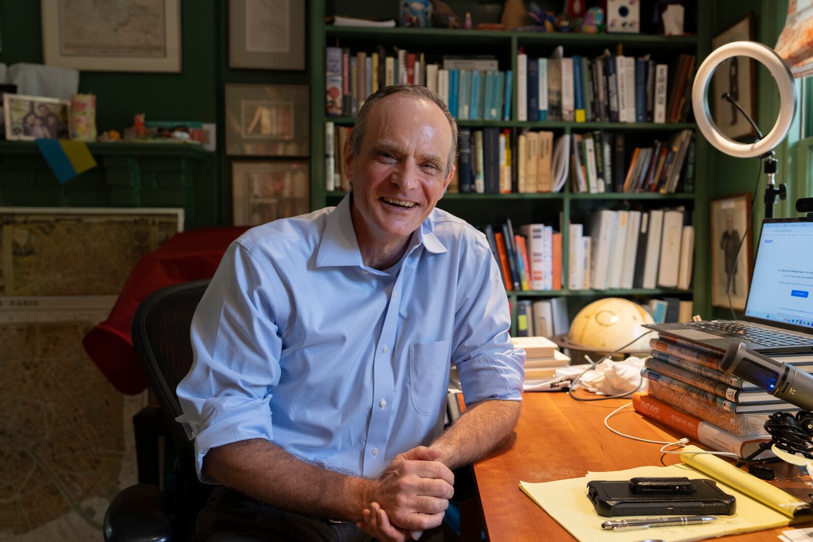 FILE - Economist Simon Johnson poses for a photograph after jointly winning the Nobel memorial prize in economics, at his home in Washington, Oct. 14, 2024. (AP Photo/Ben Curtis, File)