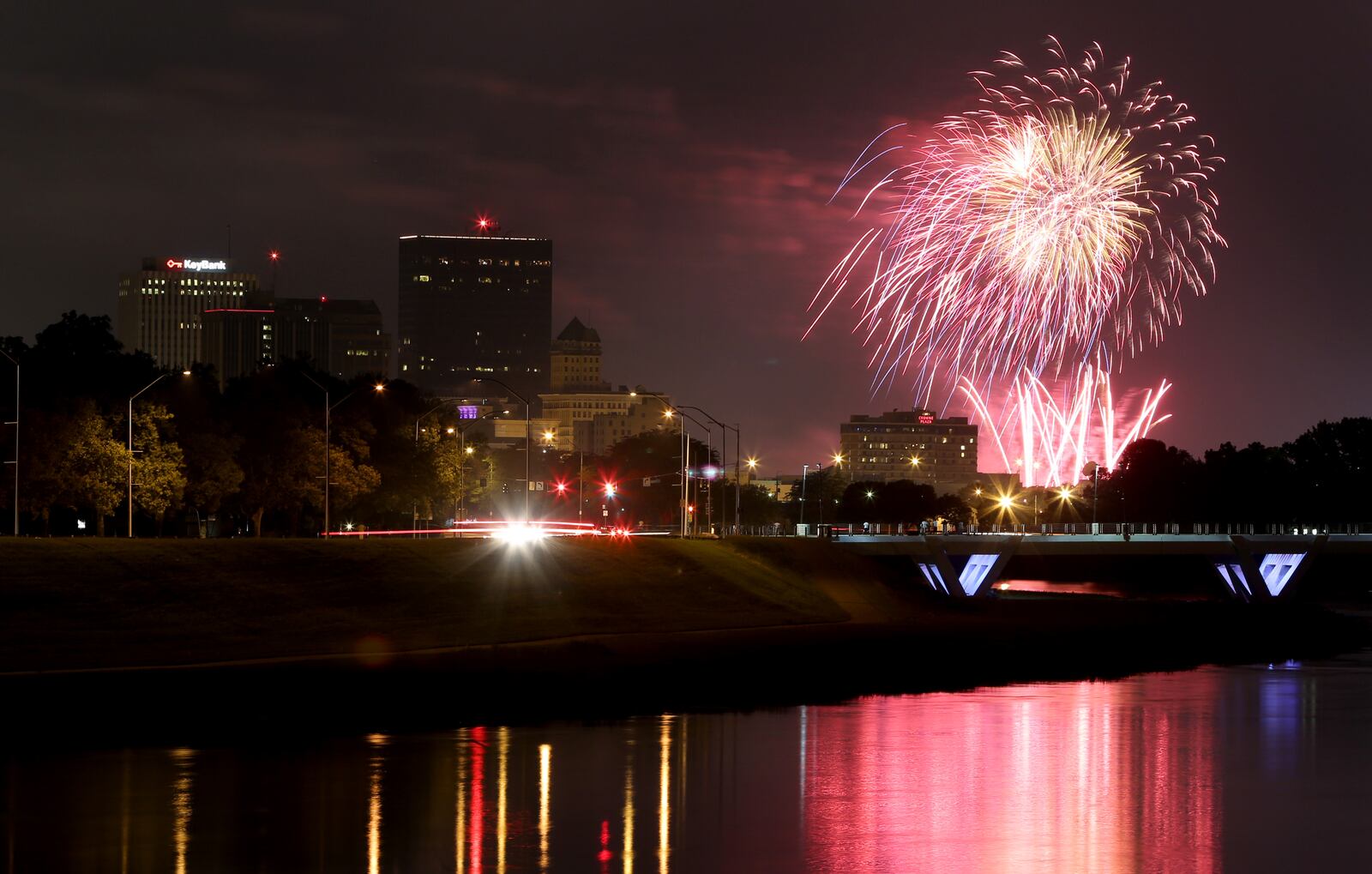 Fireworks burst over the City of Dayton Thursday night at the culmination of the Dayton Lights In Flight Fireworks Festival. A multi-cultural festival was held downtown at RiverScape MetroPark earlier in the evening that featured food and live entertainment including Alexis Gomez, Son del Caribe, American Bombshells and Damien Lawson. LISA POWELL / STAFF
