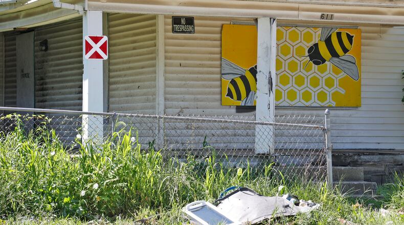 An abandoned house in Springfield on August 8, 2023. City officials are using new tools to improve neighborhoods, including separate registries for vacant properties and rental properties, plus a court receivership program that enables the city to seize abandoned and neglected properties. BILL LACKEY/STAFF