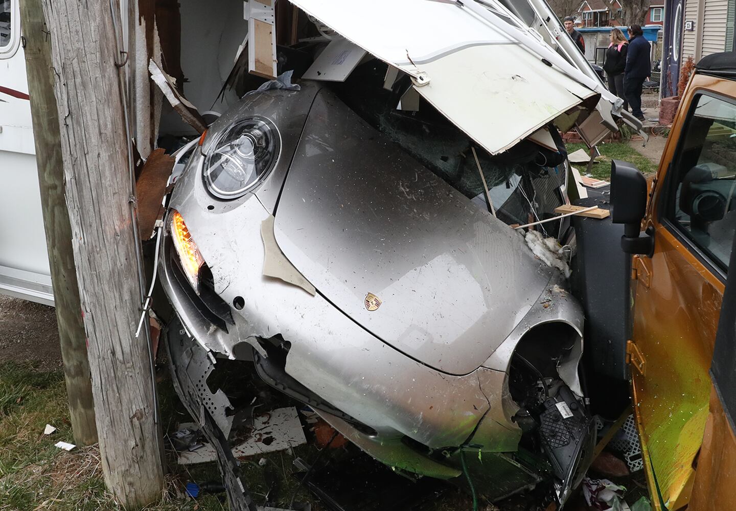 PHOTOS: Porsche Crashes Through Camper