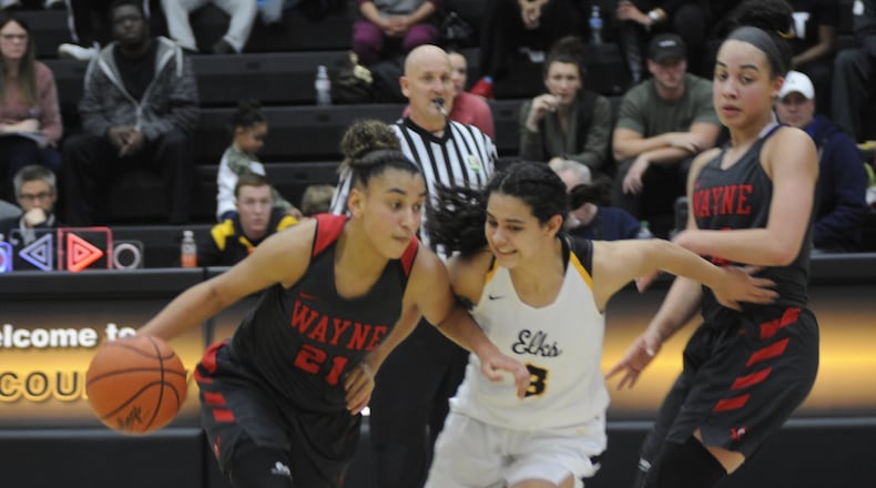 Wayne’s Destiny Bohanon (with ball) is guarded by Centerville’s Amy Velasco. Centerville defeated visiting Wayne 66-60 in a girls high school basketball game on Monday, Dec. 17, 2018. MARC PENDLETON / STAFF