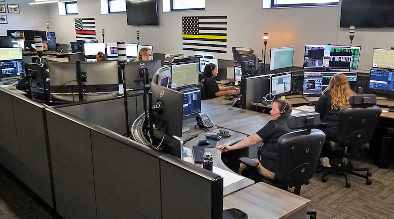Dispatchers in the new 9-1-1 Communication Center at work Friday, August 25, 2023. BILL LACKEY/STAFF
